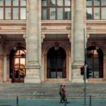 person walking pass building - Europe., tags: dass spanien die der verletzt - unsplash