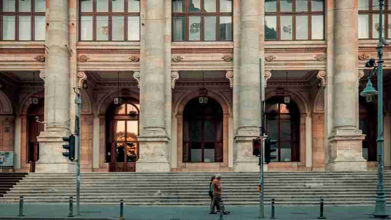 person walking pass building - Europe., tags: dass spanien die der verletzt - unsplash